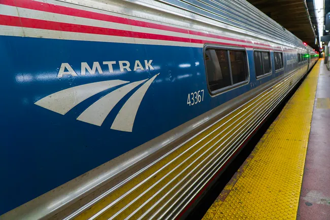 Side view of an Amtrak train.
