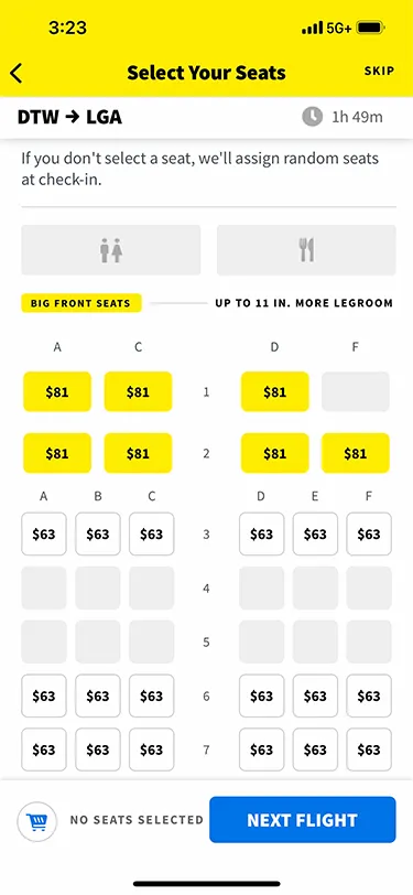 Screenshot from the Spirit app showing the price for Big Front Seats on a flight from DTW to LGA. Author walks through the process of flying Spirit Airlines.