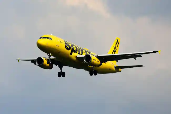 Picture of a Spirit Airlines airplane in the air.