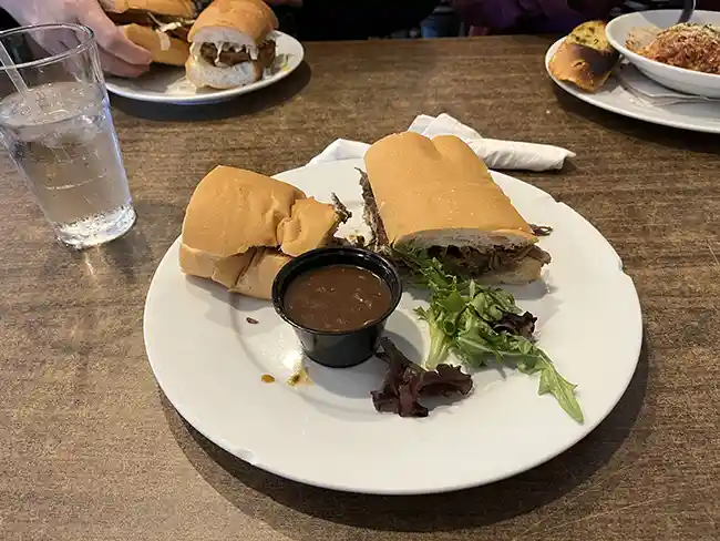 Picture of a roastbeef with gravy po'boy.