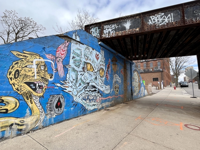 A mural at a bridge in the Creative District nearby S 1st St & W Washington in downtown Ann Arbor.