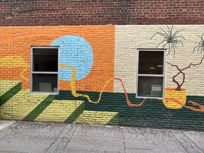 A mural by artist Nina Shahin in downtown Ann Arbor as part of A2AC murals.