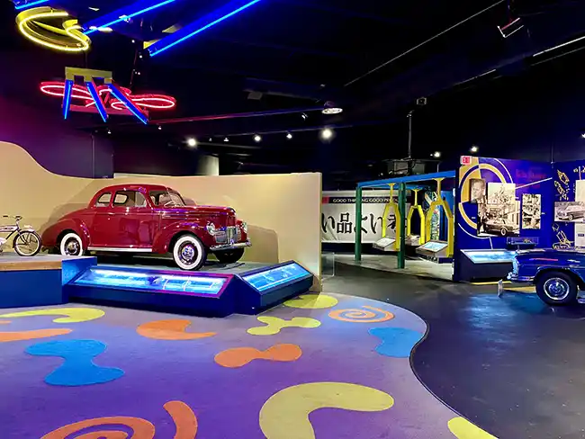 An exhibit inside the Automobile Hall of Fame. The Automobile Hall of Fame is one of the best things to do in Dearborn, MI