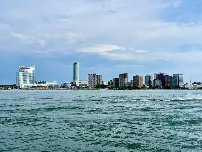 View of Windsor, Ontario from the Detroit side of the Detroit River. Walking along the Detroit riverfront is one of the most fun things to do in Detroit!