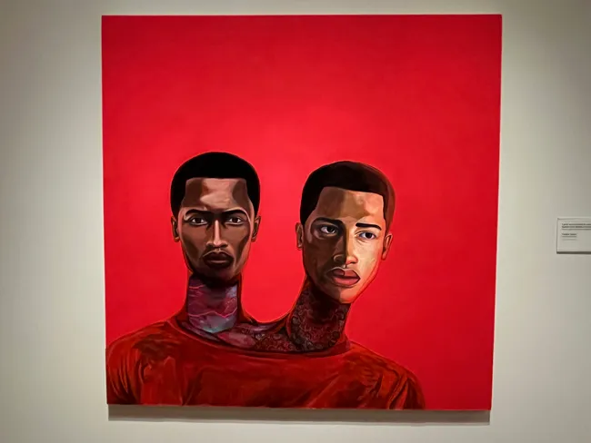 A painting inside the African American art section of the Detroit Institute of Arts entitled ' I Grew an Extra Head to Watch Over My Brother (The Middle of Nowhere) by Vaughn Spann.