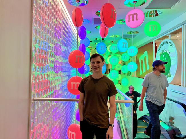 Second floor of the M&M store in Mall of America where you see candy shaped lights that rapidly change colors.