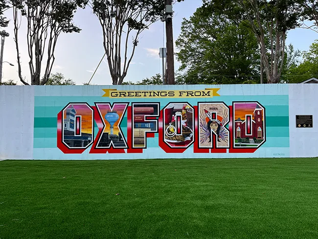 A greeting mural with the text 'GREETINGS FROM OXFORD', located on the campus of the University of Mississppi in Oxford, Mississippi