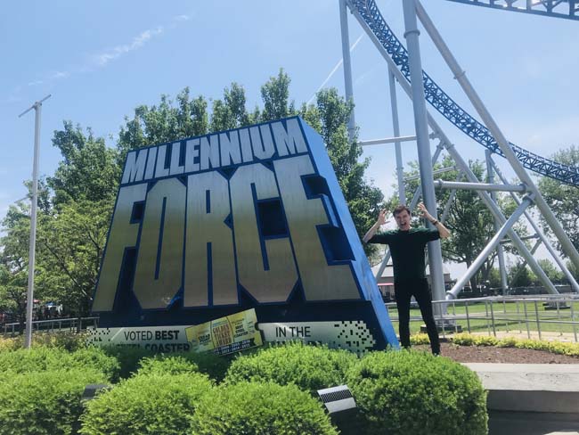 Outside the entrance to one of Cedar Point's most popular, tall, and fast rollercoasters-- the Millennium Force. Cedar Point is one of the 7 midwest landmarks you must see before you die.