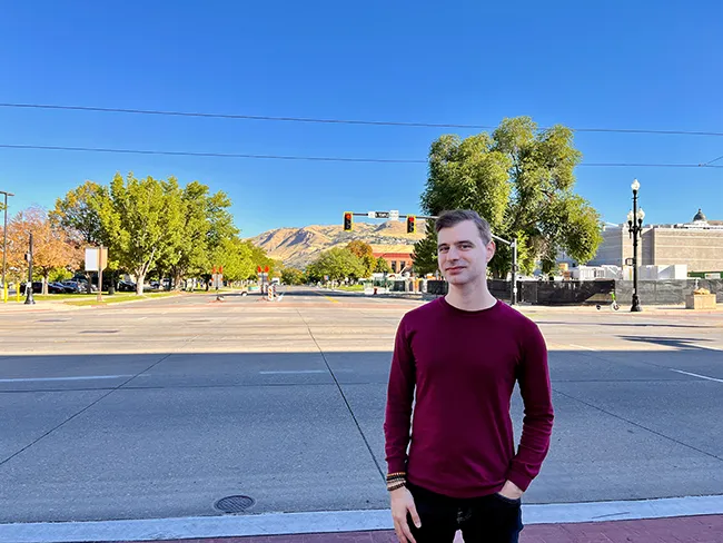 Author standing near mountains in Salt Lake City.