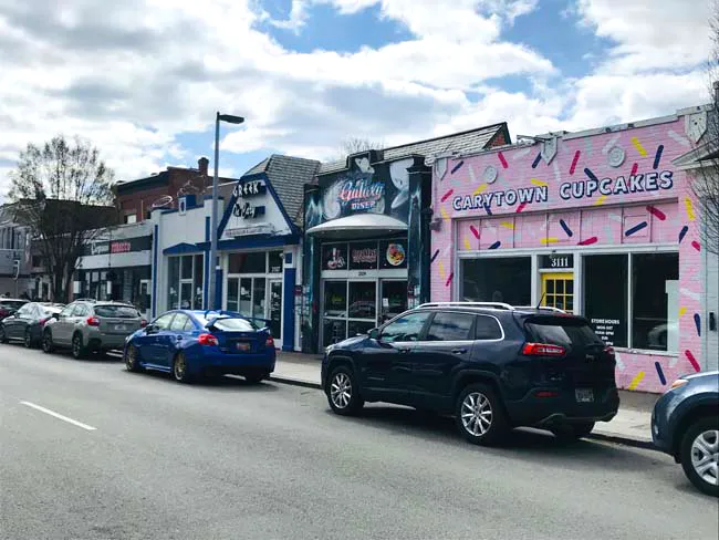 One way to have a fun weekend in Richmond is by visiting Carytown. A bakery, diner, and other local businesses are seen here off Cary Street in Richmond, Virginia.